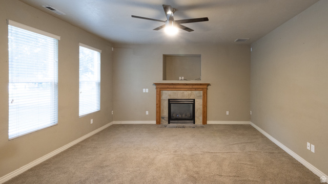 293 North 550 West Springville, UT 84663 - Photo 8 of 33 Living room with fireplace and large windows