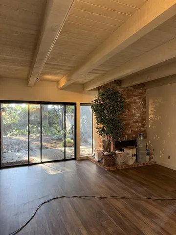 a kitchen with stainless steel appliances granite countertop a sink and a stove