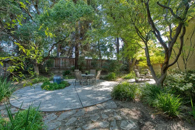 a view of a backyard with patio