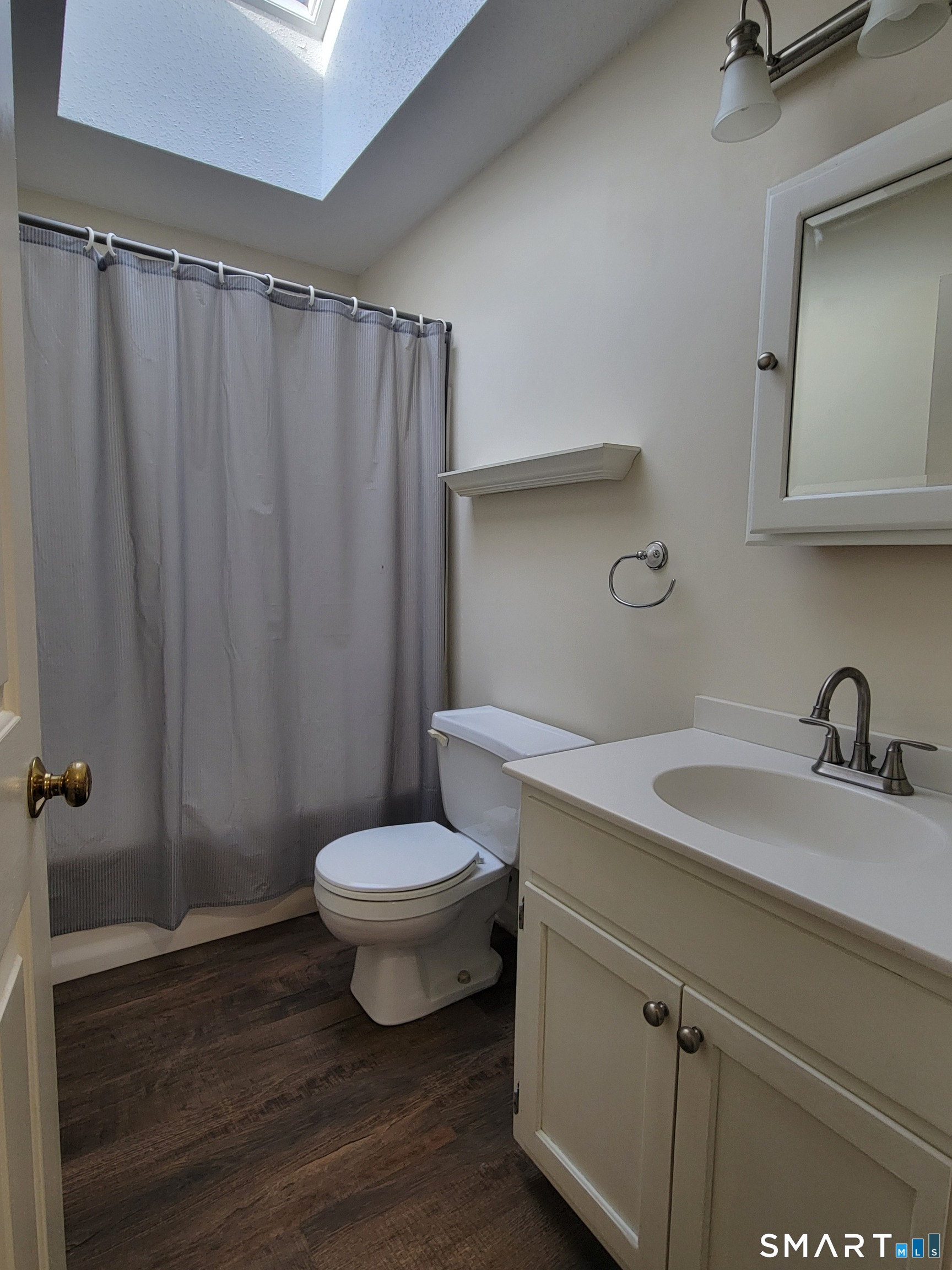 799 Middle Turnpike Mansfield, CT 06268 - Photo 14 of 18 a bathroom with a sink a toilet and shower