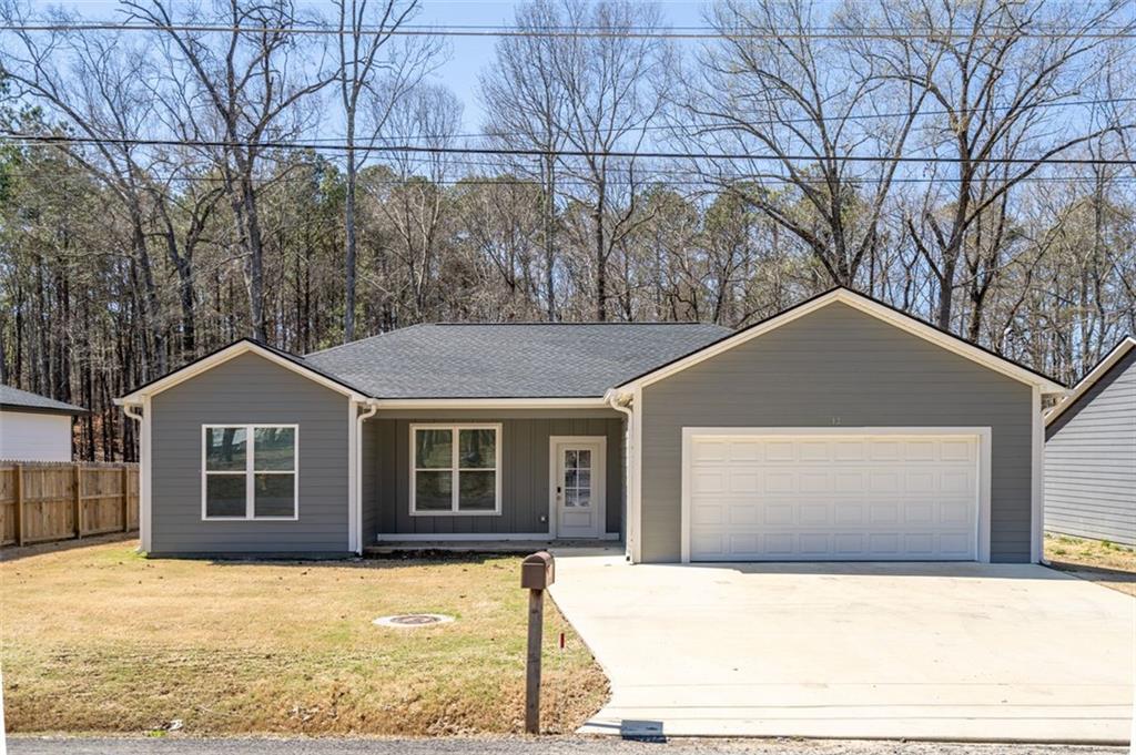 a front view of a house with yard