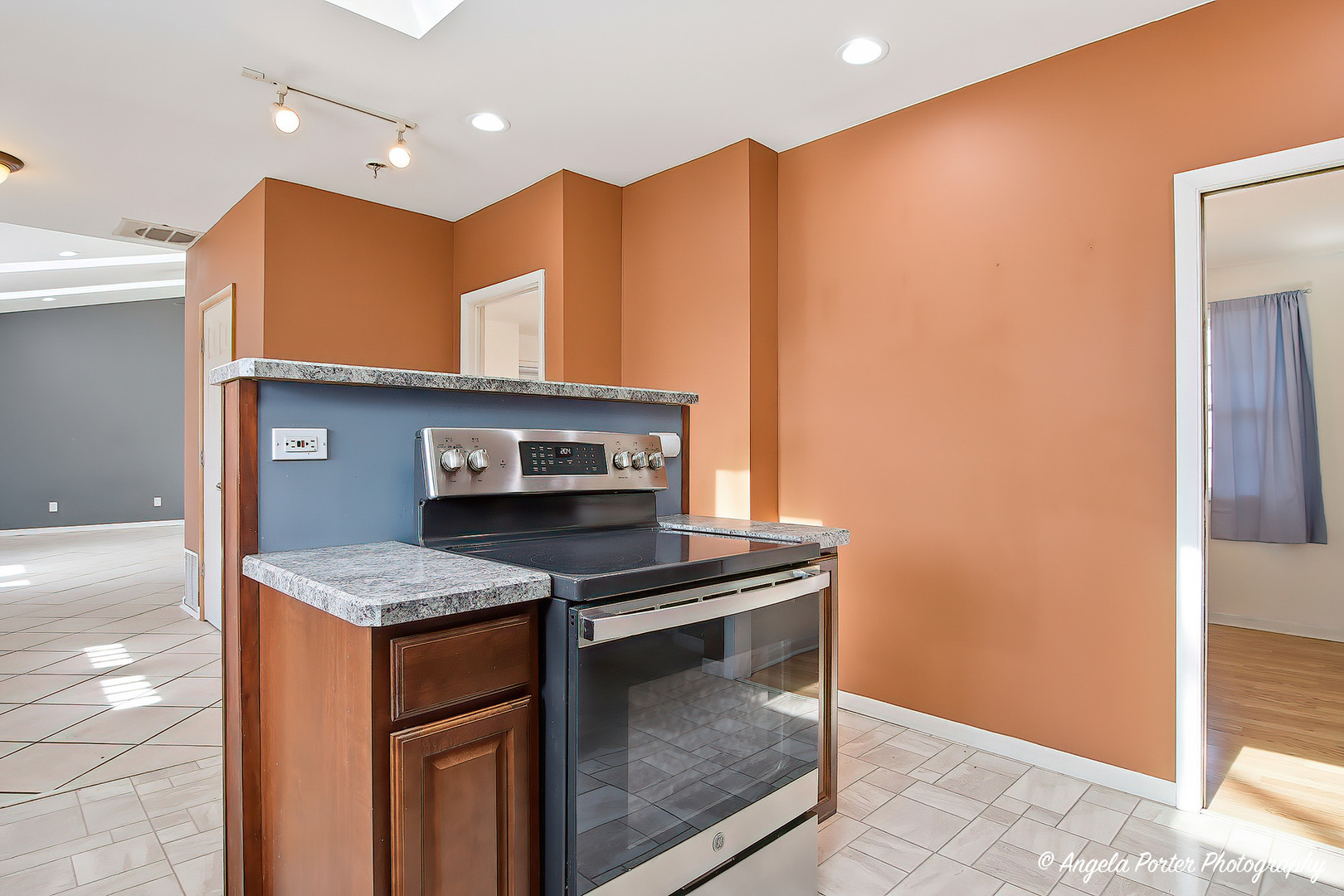 4320 West Lakewood Road McHenry, IL 60050 - Photo 15 of 50 a kitchen with stainless steel appliances granite countertop a stove a sink and a microwave