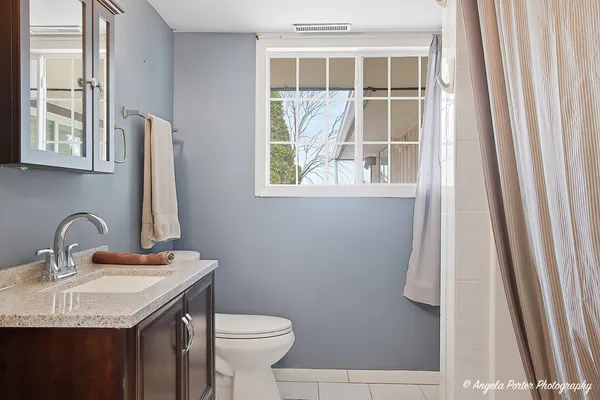 a bathroom with a sink and a toilet