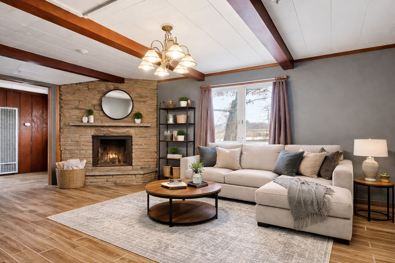 4320 West Lakewood Road McHenry, IL 60050 - Photo 20 of 50 a living room with furniture a fireplace and a large window