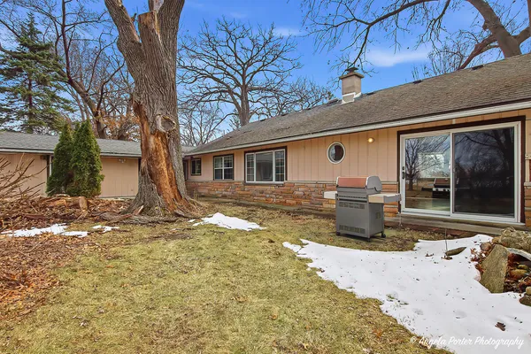 a view of a back yard of the house