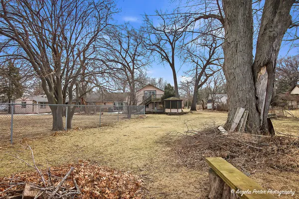 a view of yard covered with snow