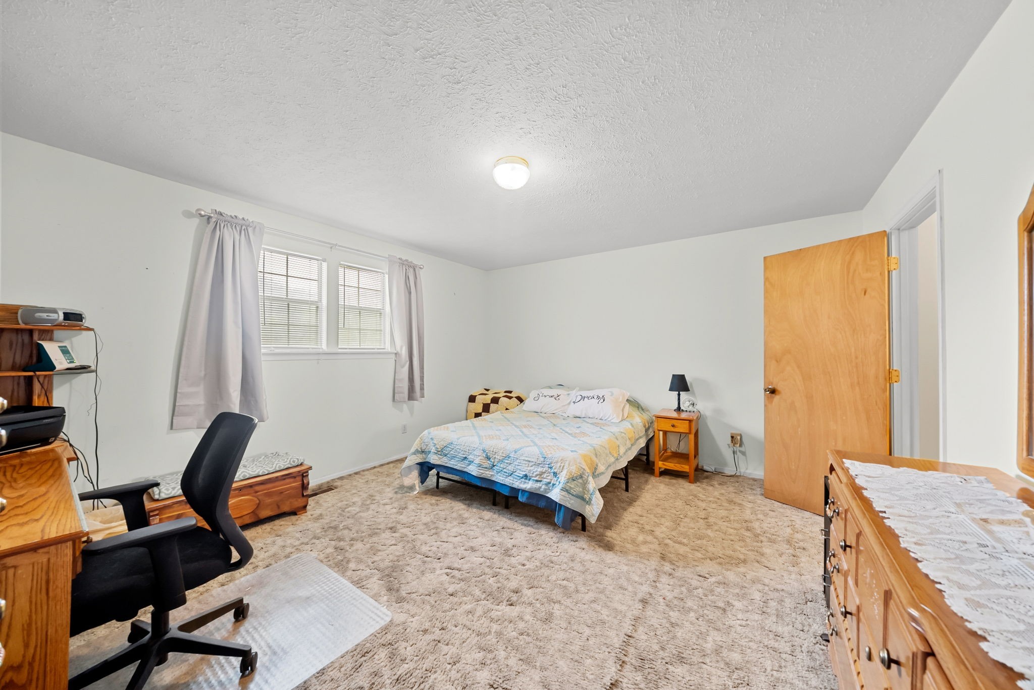 3966 Taz Hyde Road Nashville, TN 37218 - Photo 14 of 48 a bedroom with furniture and a window
