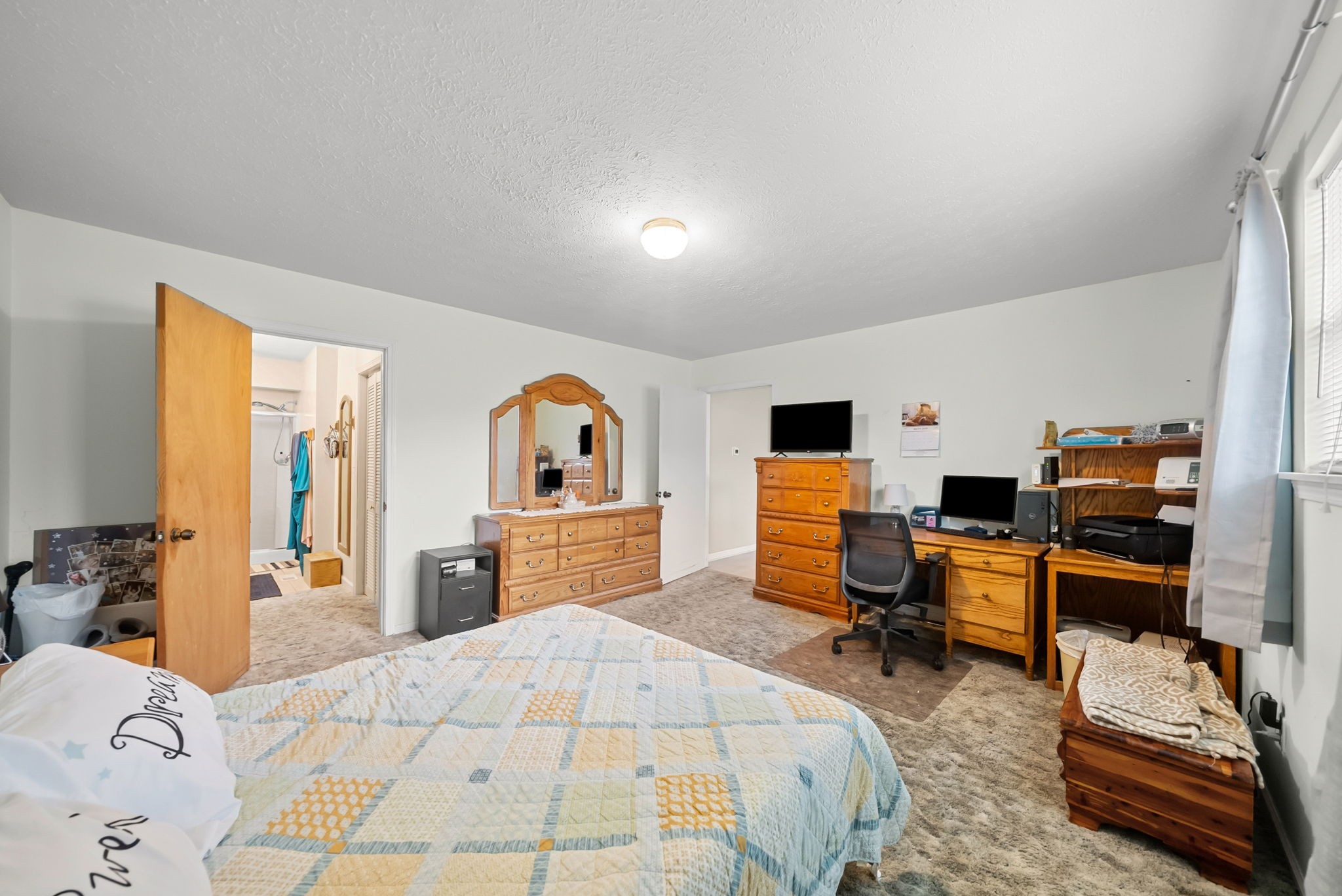 3966 Taz Hyde Road Nashville, TN 37218 - Photo 15 of 48 a bed room with a bed and a chair