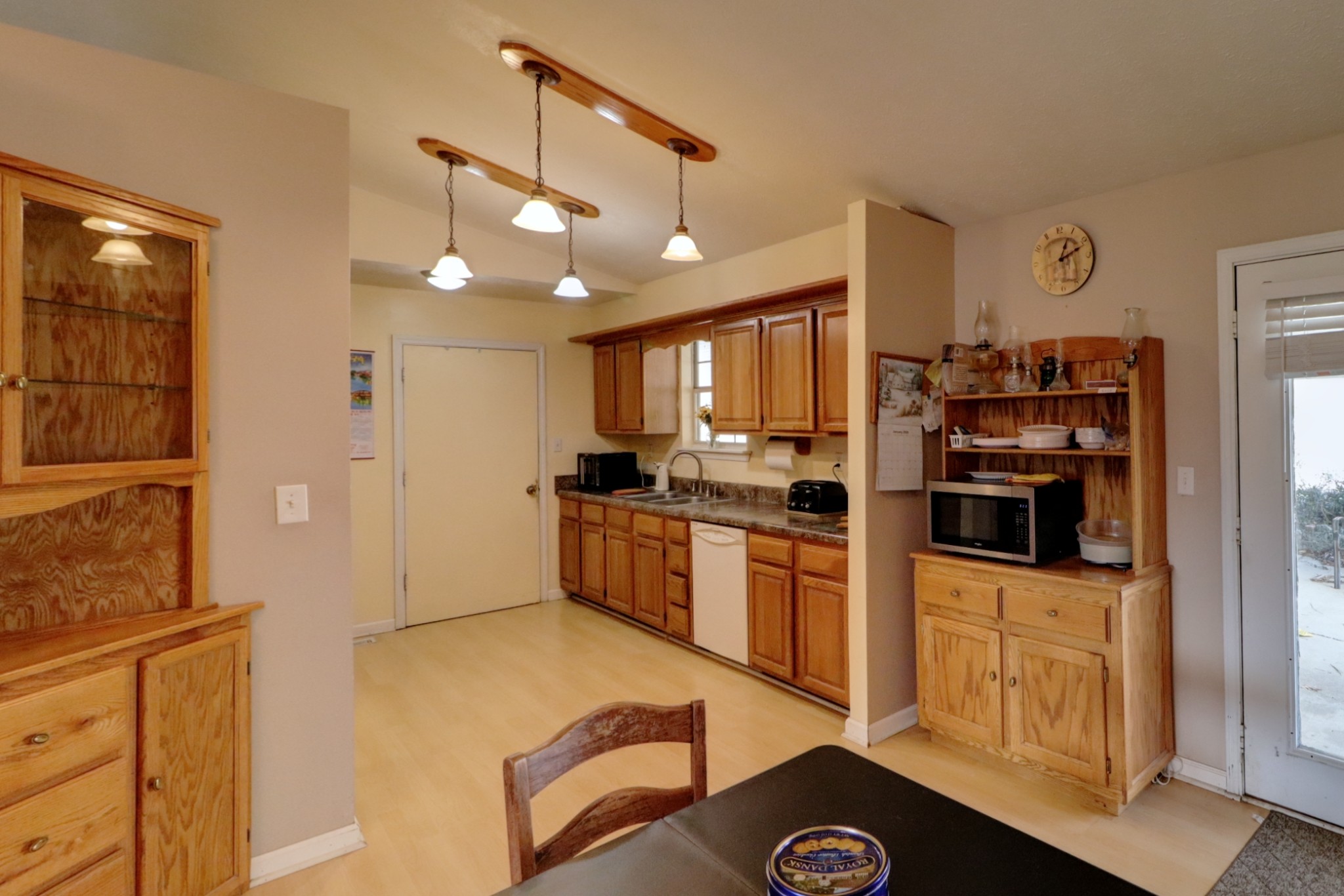 3966 Taz Hyde Road Nashville, TN 37218 - Photo 4 of 17 a kitchen with stainless steel appliances kitchen island granite countertop a refrigerator and stove