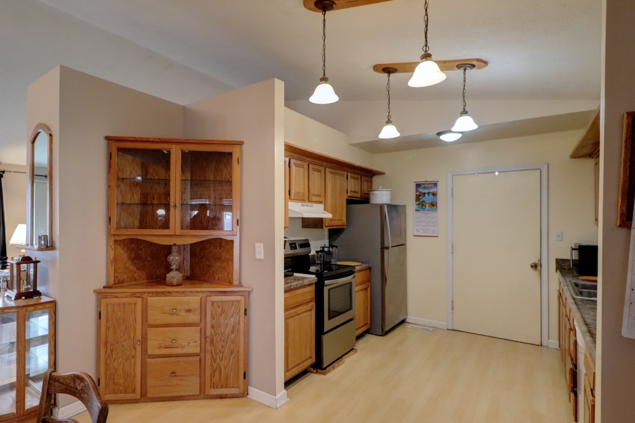 3966 Taz Hyde Road Nashville, TN 37218 - Photo 5 of 17 a kitchen with stainless steel appliances granite countertop a refrigerator and a stove top oven