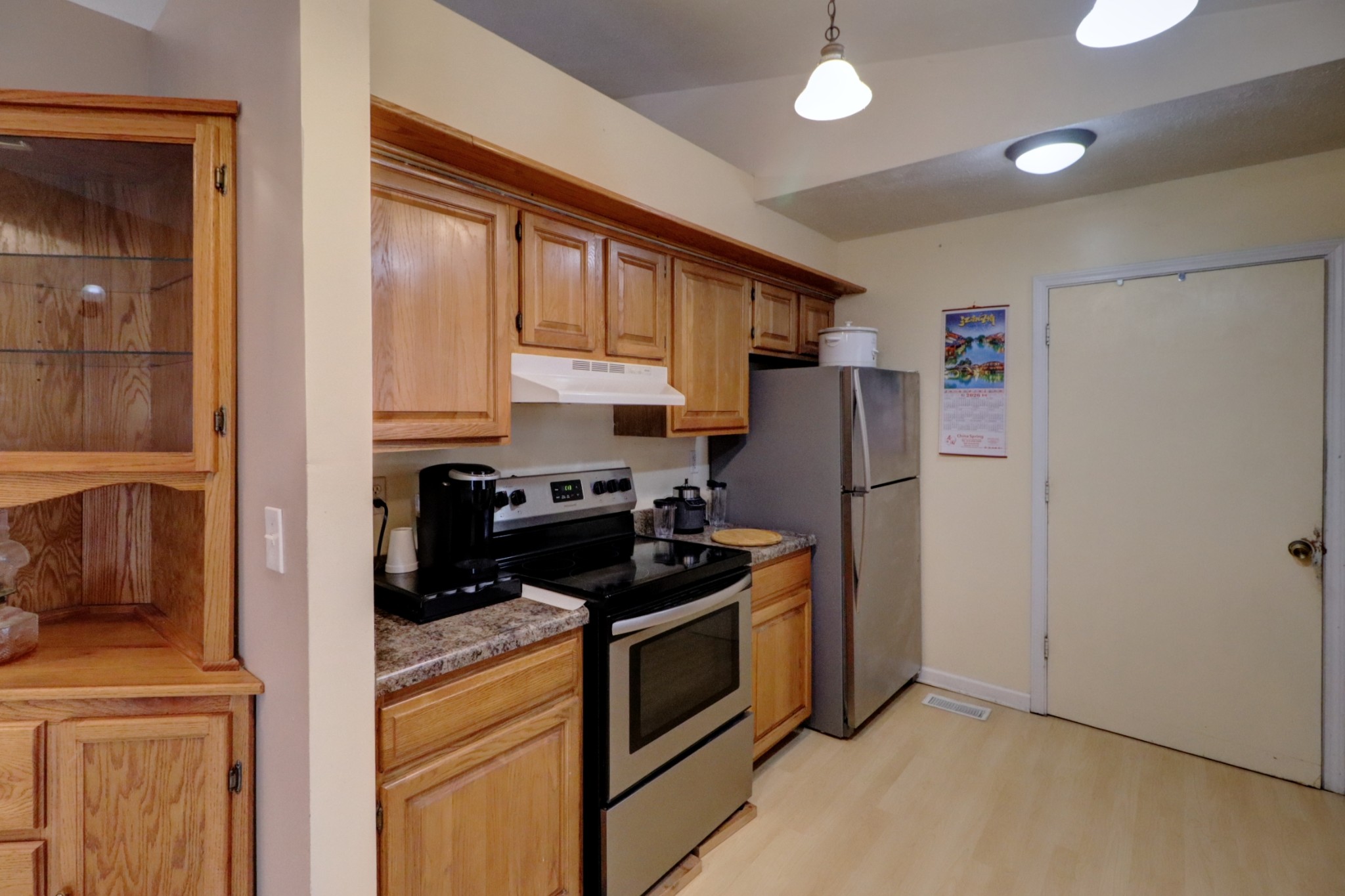 3966 Taz Hyde Road Nashville, TN 37218 - Photo 6 of 17 a kitchen with a refrigerator and a stove