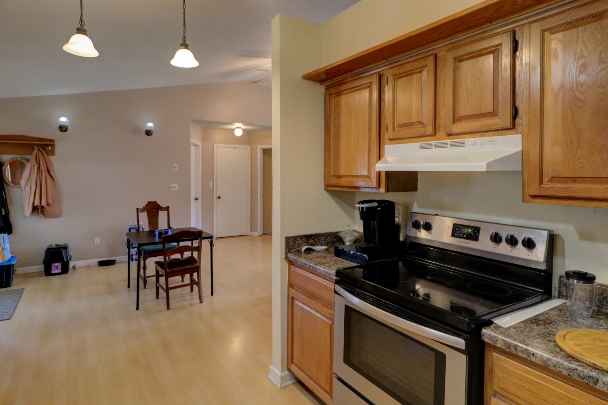 3966 Taz Hyde Road Nashville, TN 37218 - Photo 7 of 17 a kitchen with stainless steel appliances granite countertop a stove a sink and a microwave