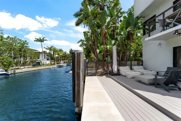 a view of a lake with couches