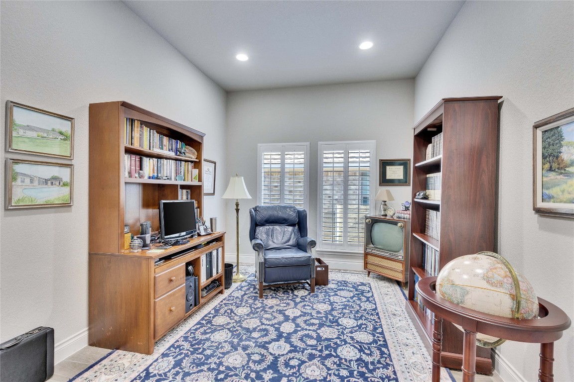 4229 Mercer Road Georgetown, TX 78628 - Photo 23 of 38 Living area featuring baseboards and recessed lighting