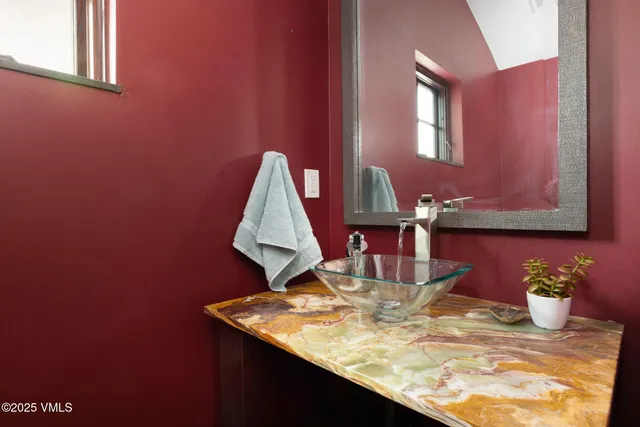 a bedroom with bed and window