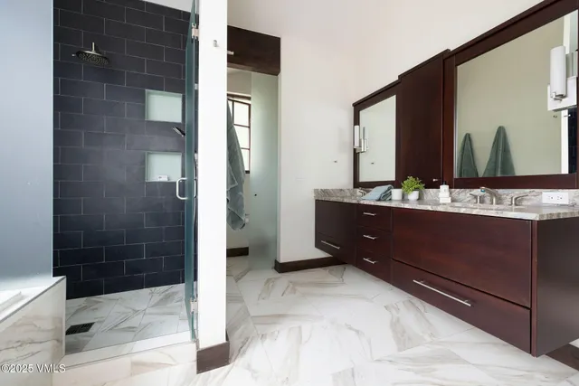 a view of balcony with furniture and wooden floor