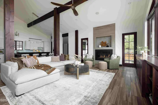 a bedroom with bed and wooden floor