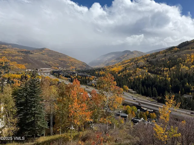 a view of a city with mountain