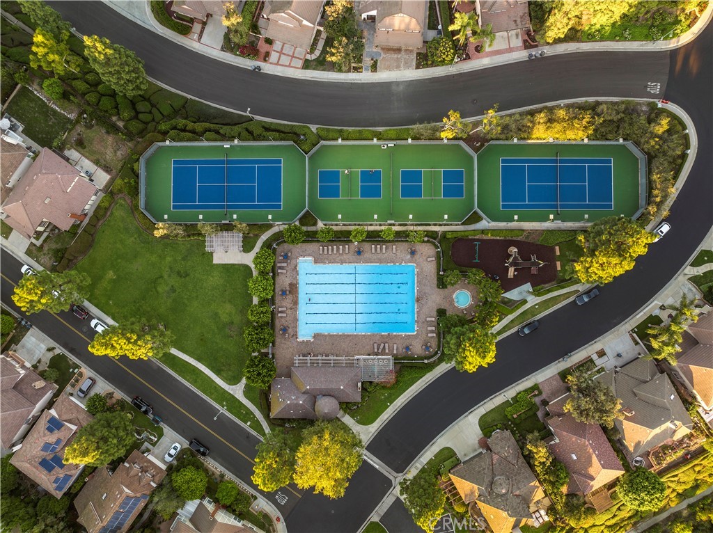 6129 East Joan D Arc Circle Orange, CA 92869 - Photo 13 of 27 an aerial view of a house with a yard basket ball court and outdoor seating