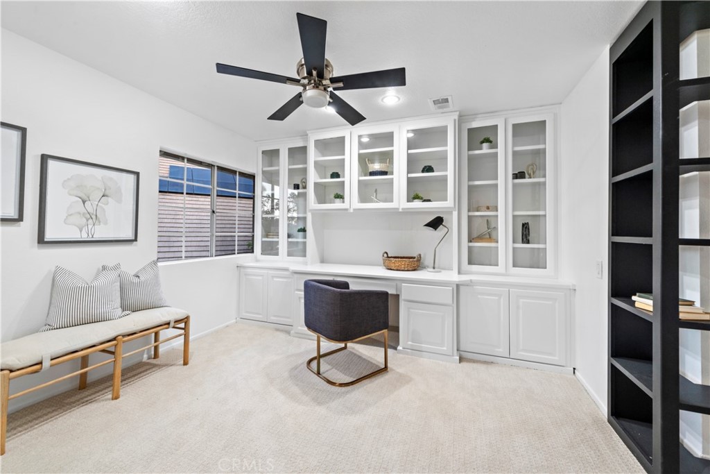 6129 East Joan D Arc Circle Orange, CA 92869 - Photo 20 of 27 a living room with furniture and a window