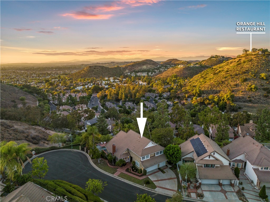 6129 East Joan D Arc Circle Orange, CA 92869 - Photo 2 of 27 an aerial view of residential houses with outdoor space