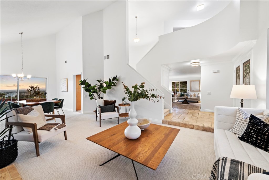 6129 East Joan D Arc Circle Orange, CA 92869 - Photo 6 of 27 a living room with furniture and a table