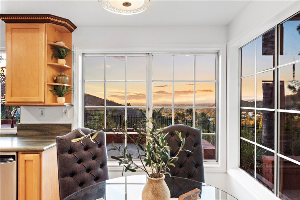 6129 East Joan D Arc Circle Orange, CA 92869 - Photo 10 of 27 a view of a living room with furniture and floor to ceiling window