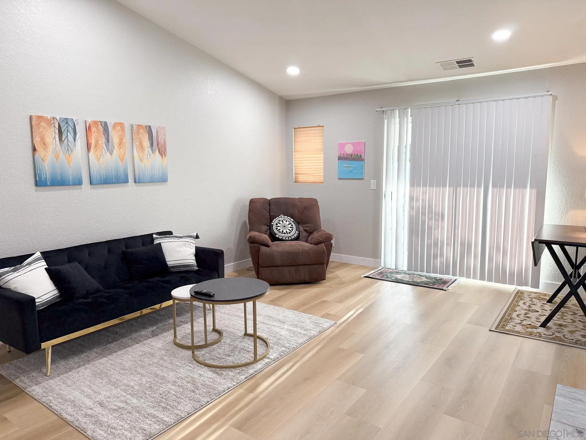1457 Fallsview Place Escondido, CA 92027 - Photo 15 of 41 a living room with furniture and a rug