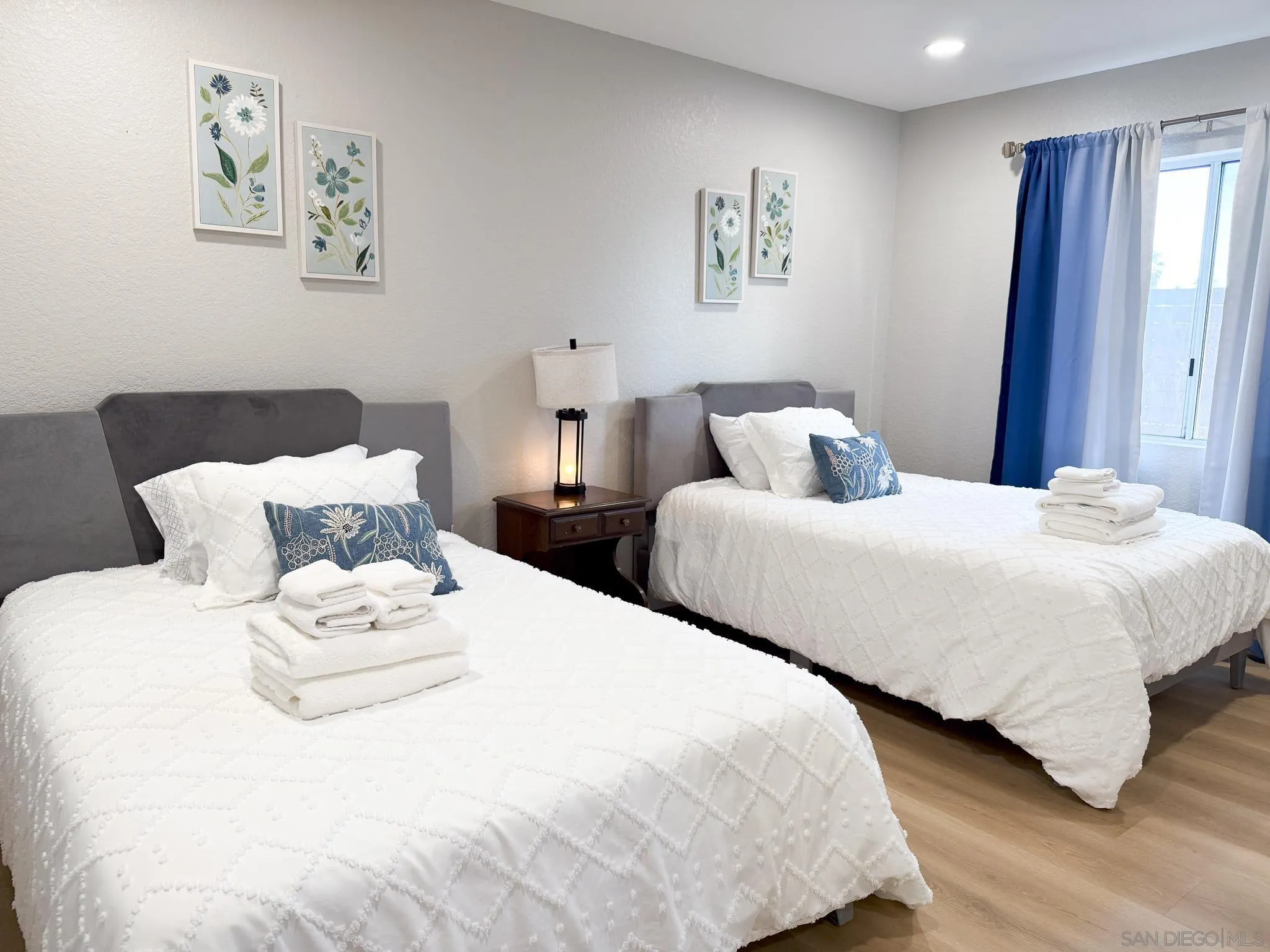 1457 Fallsview Place Escondido, CA 92027 - Photo 29 of 41 a large white bed in a white room