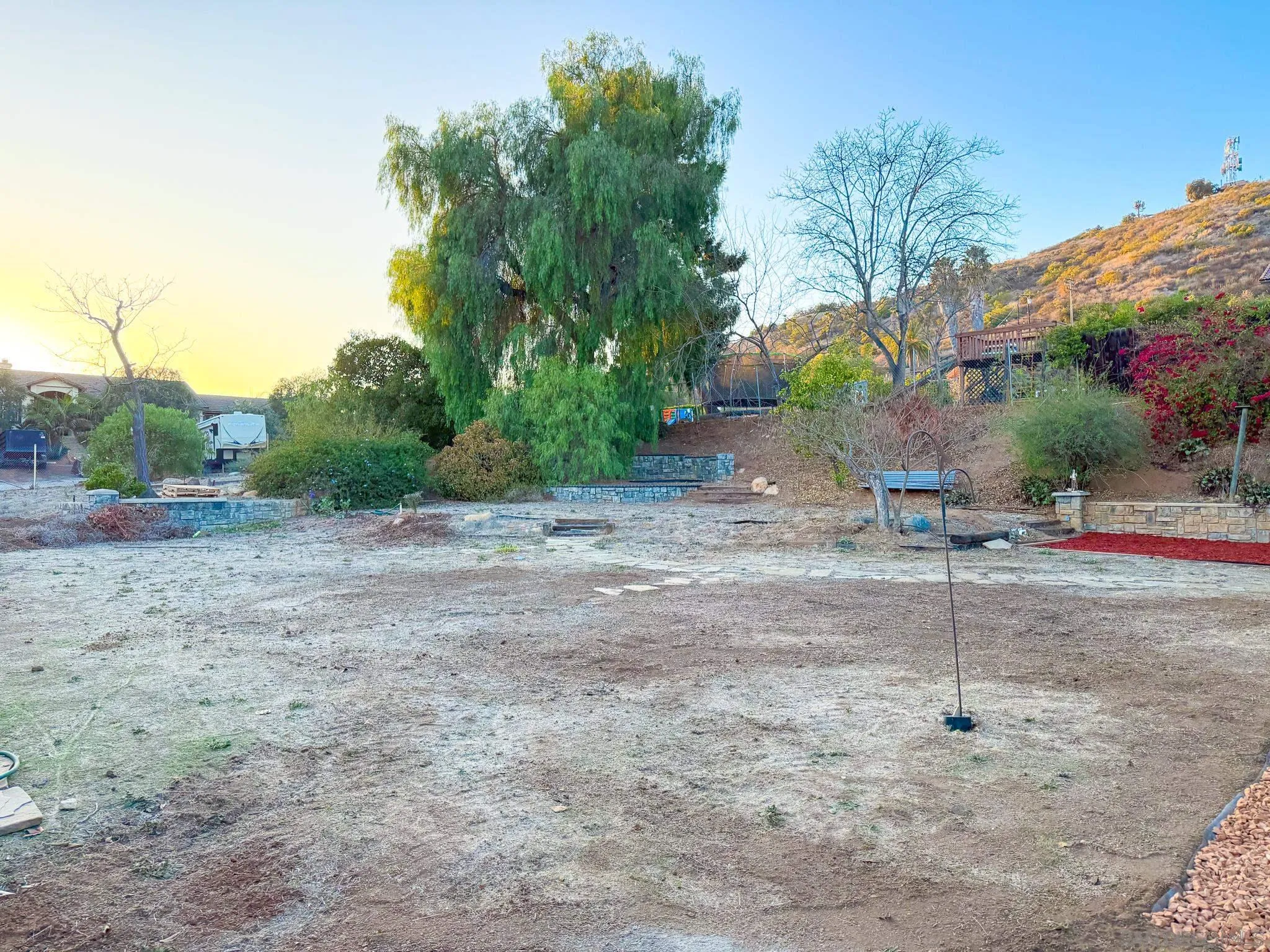 1457 Fallsview Place Escondido, CA 92027 - Photo 36 of 41 a backyard of a house with lots of green space