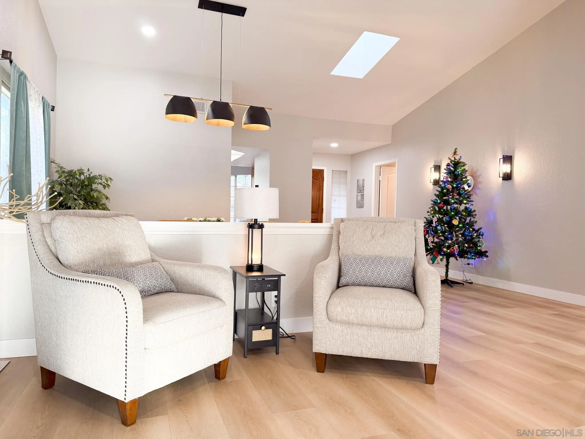 1457 Fallsview Place Escondido, CA 92027 - Photo 7 of 41 a living room with furniture and a potted plant