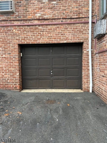 63 Troy Drive, Unit A Springfield, NJ 07081 - Photo 4 of 8 a view of a garage