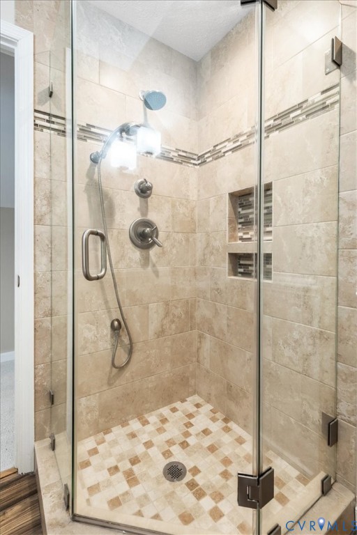 1437 Palmore Road Powhatan, VA 23139 - Photo 38 of 60 Glass-enclosed shower featuring natural-toned tile