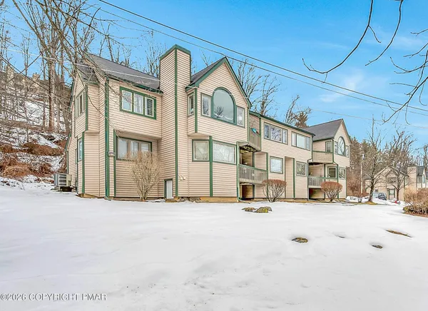 a view of a building in snow