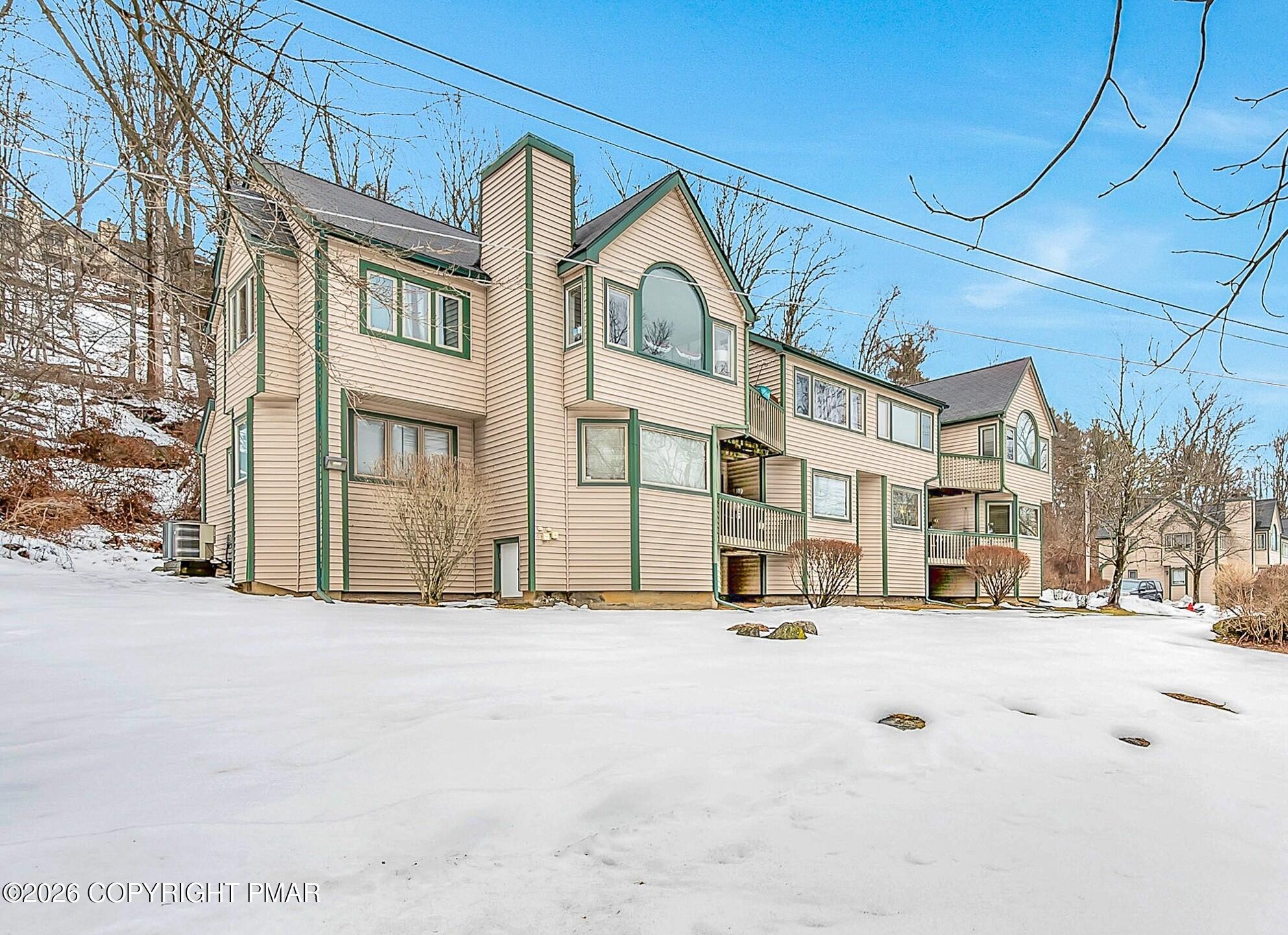 312 Hollow Road, Unit 36 East Stroudsburg, PA 18302 - Photo 1 of 34 a view of a building in snow
