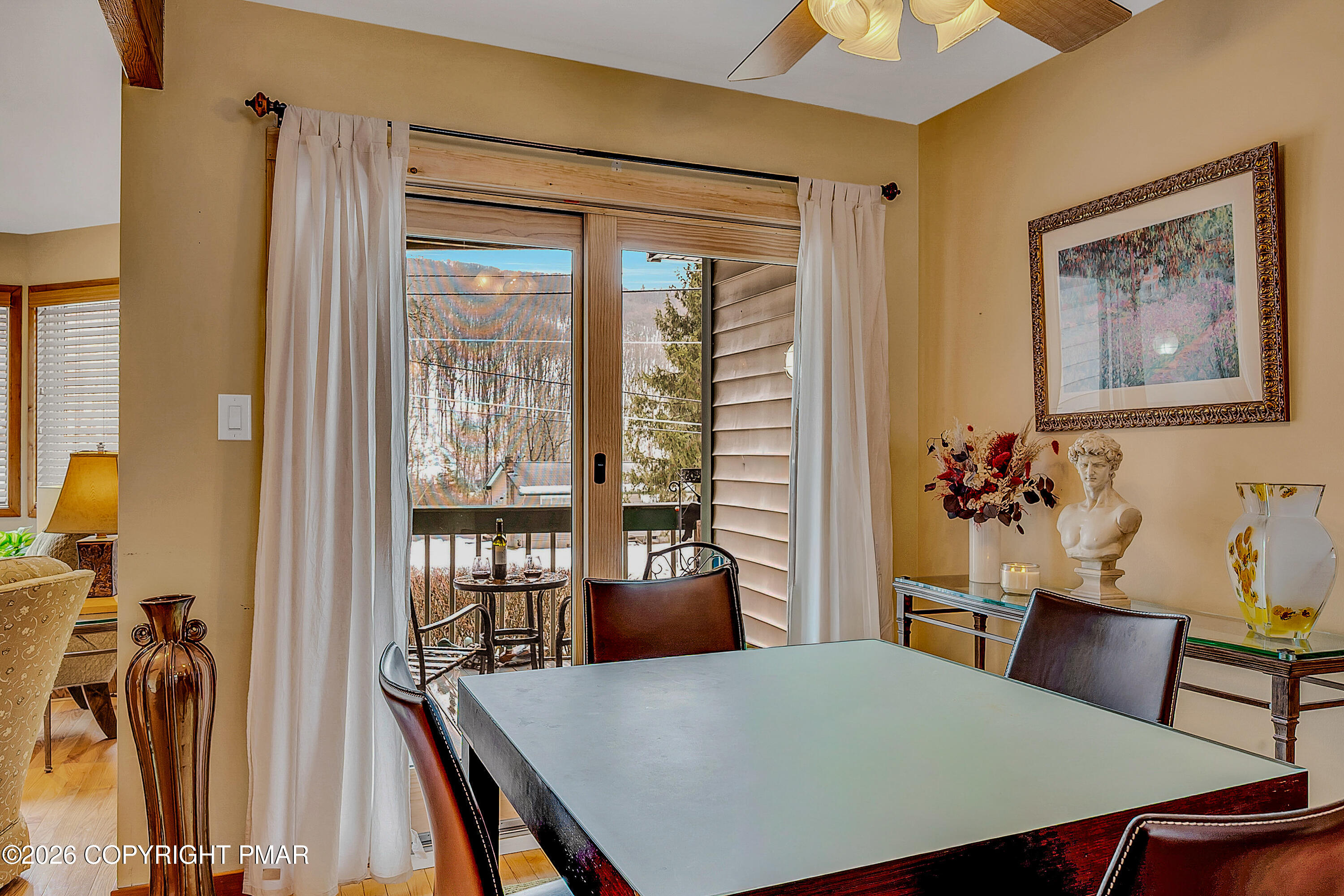312 Hollow Road, Unit 36 East Stroudsburg, PA 18302 - Photo 11 of 34 a view of a dining room with furniture window and outside view