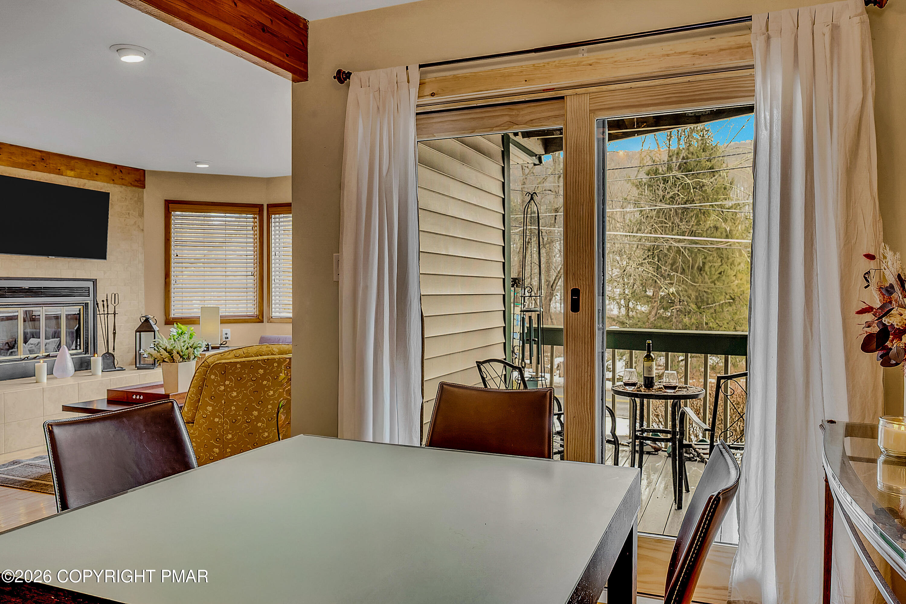 312 Hollow Road, Unit 36 East Stroudsburg, PA 18302 - Photo 12 of 34 a bedroom with a bed and glass door