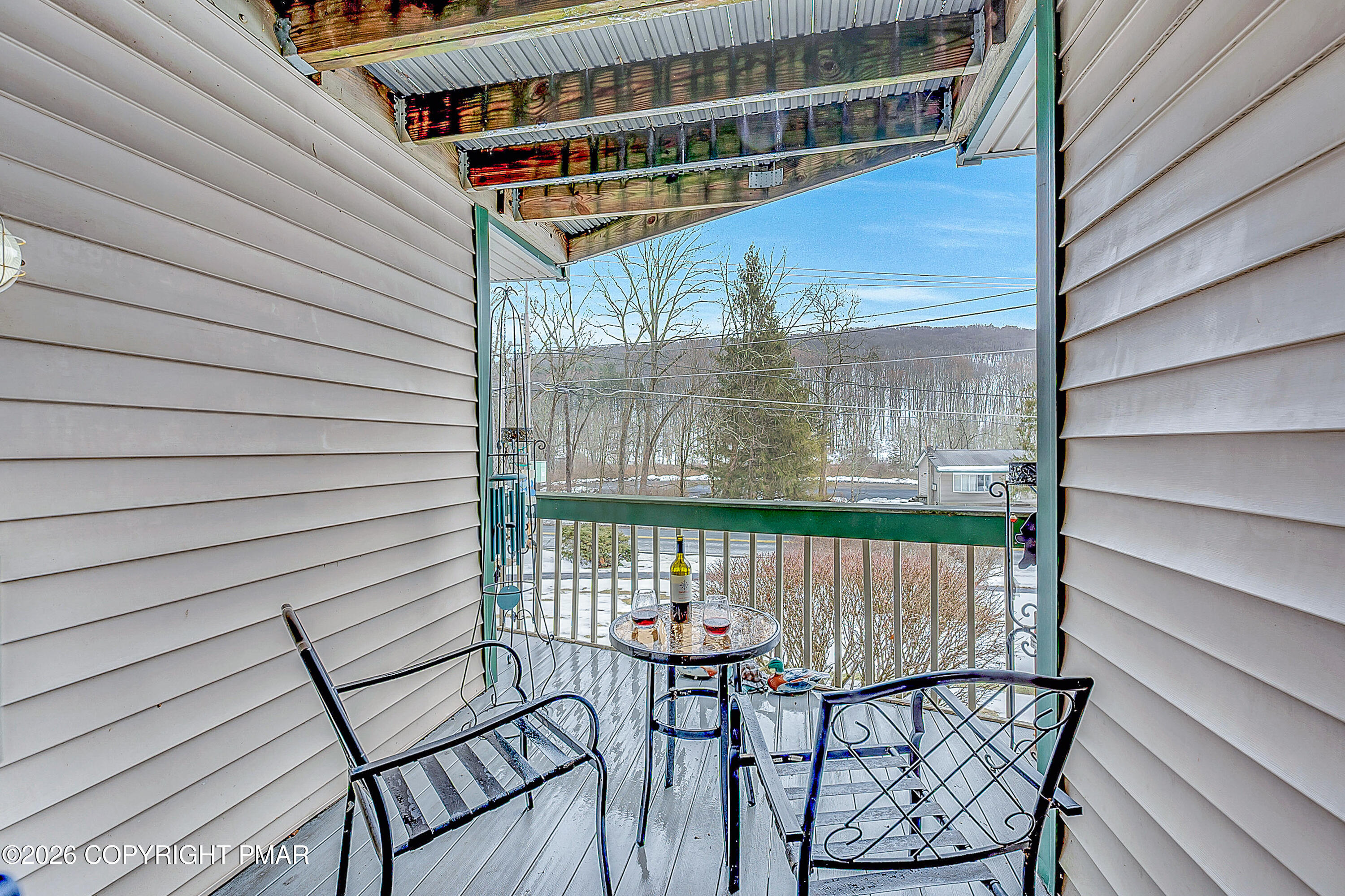 312 Hollow Road, Unit 36 East Stroudsburg, PA 18302 - Photo 13 of 34 a view of a balcony with furniture