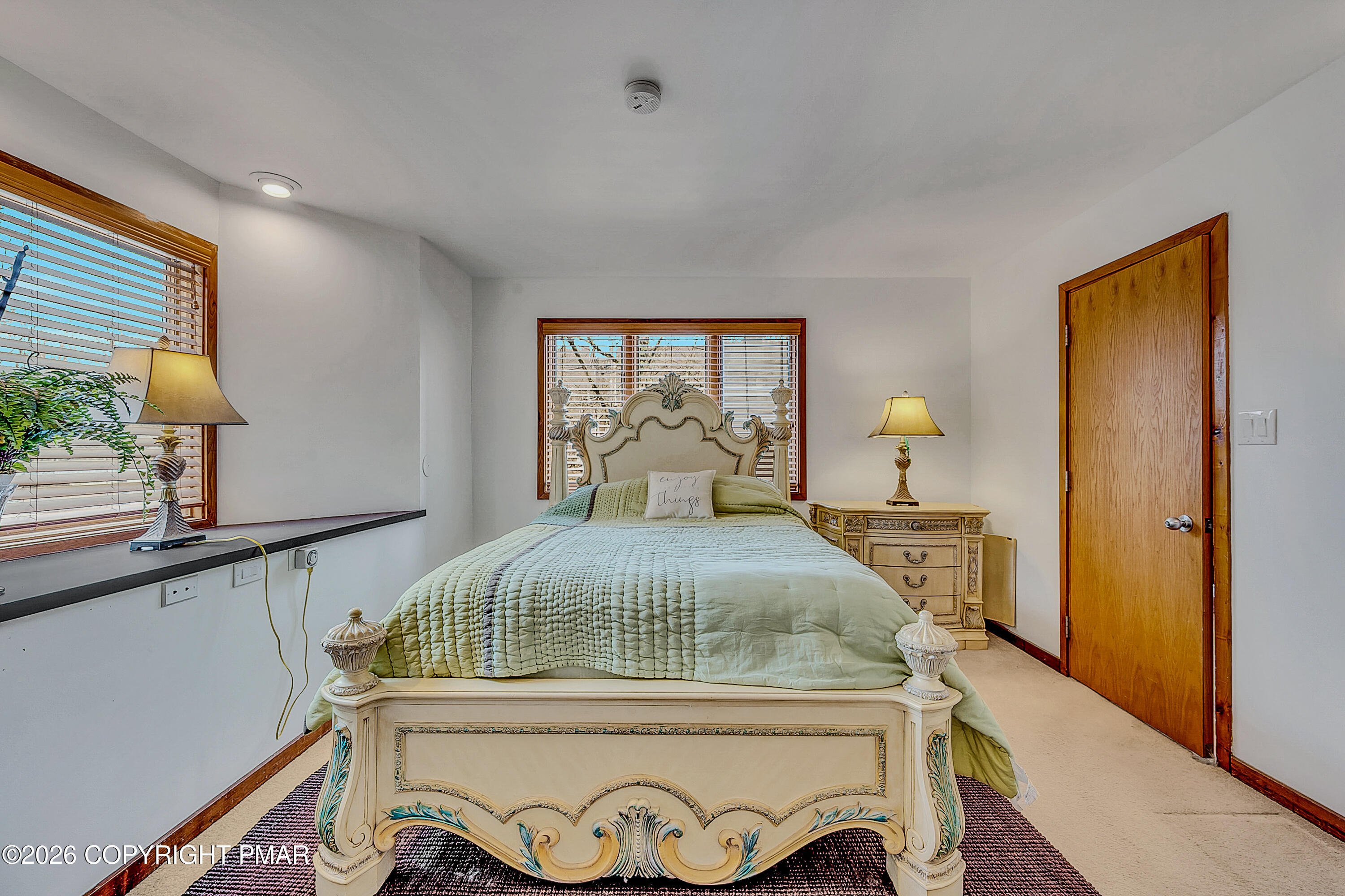 312 Hollow Road, Unit 36 East Stroudsburg, PA 18302 - Photo 23 of 34 a bedroom with a bed and a window