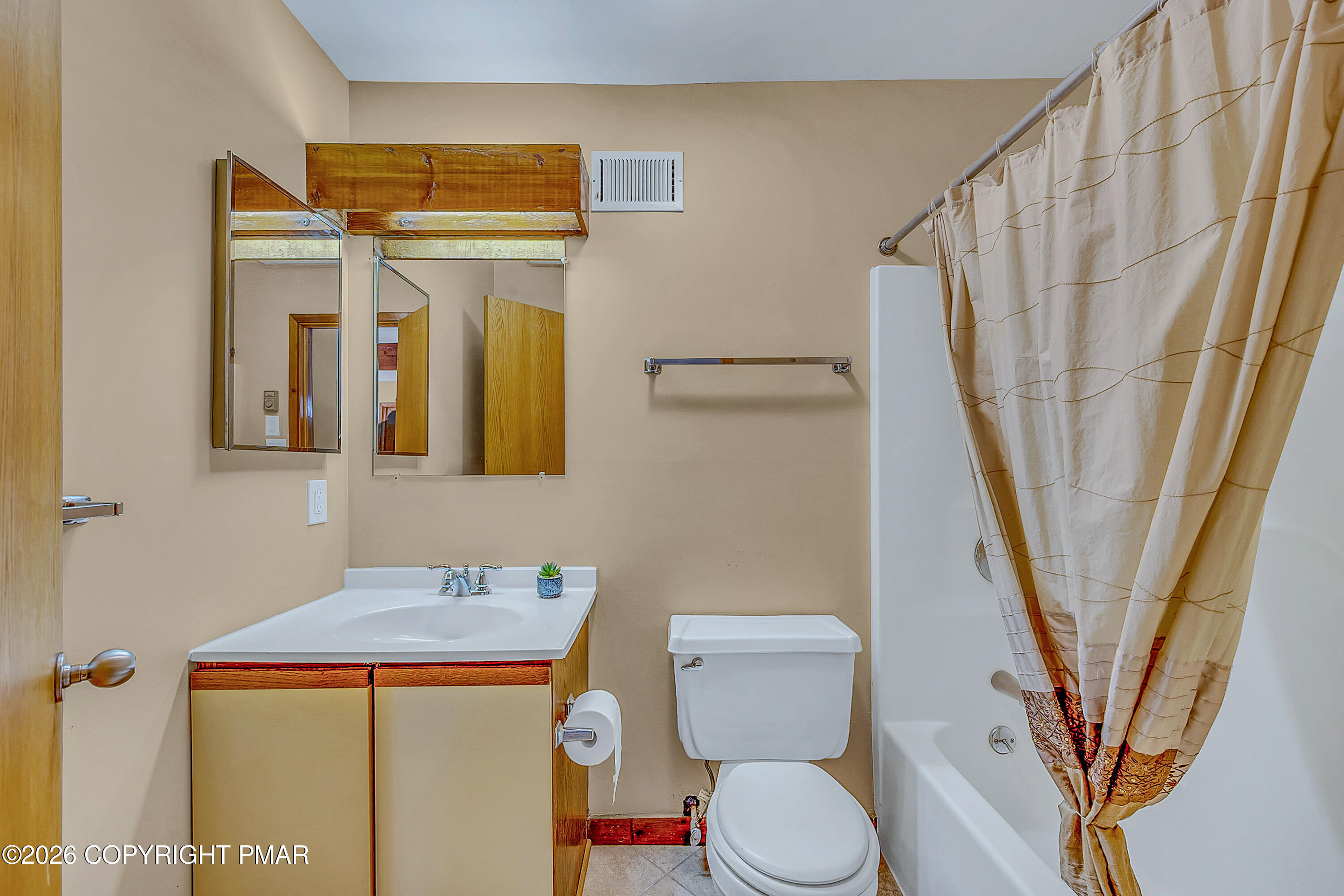 312 Hollow Road, Unit 36 East Stroudsburg, PA 18302 - Photo 28 of 34 a bathroom with a toilet and a shower