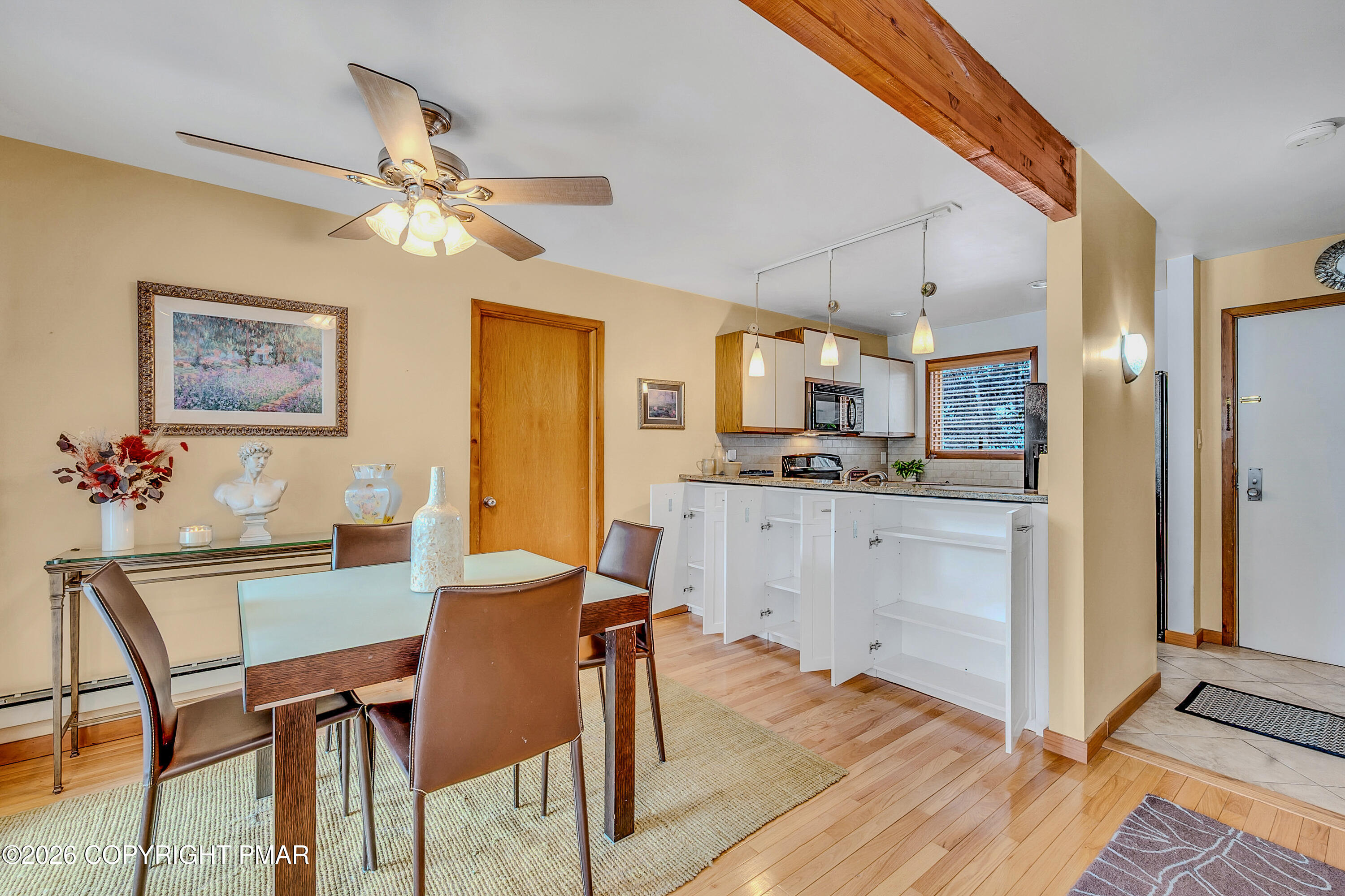 312 Hollow Road, Unit 36 East Stroudsburg, PA 18302 - Photo 8 of 34 a view of a dining room with furniture and wooden floor