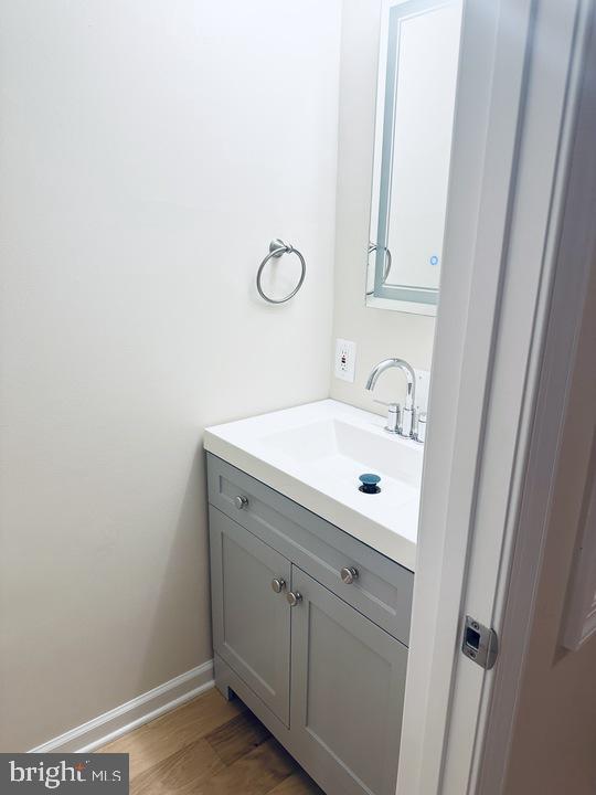 1520 Constitution Avenue Northeast Washington, DC 20002 - Photo 13 of 26 a bathroom with a sink and a mirror