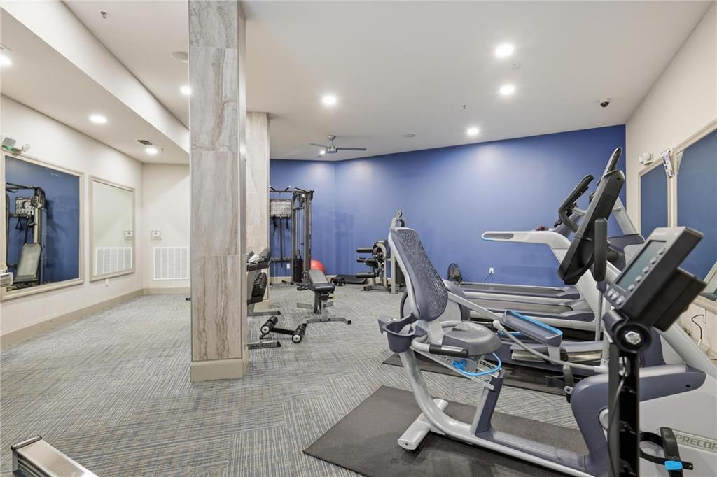 901 Abernathy Road Northeast, Unit 3080 Atlanta, GA 30328 - Photo 19 of 21 a view of a room with gym equipment