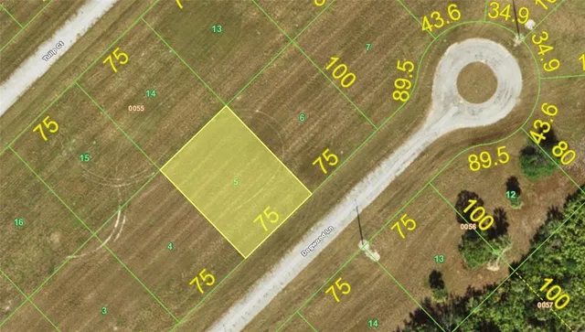 a blue sign that is sitting on a wall