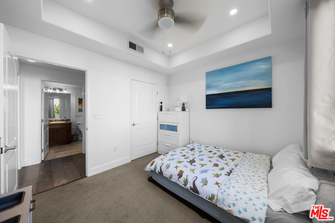 629 Traction Avenue, Unit 233 Los Angeles, CA 90013 - Photo 14 of 41 a bedroom with a bed and a view of bathroom