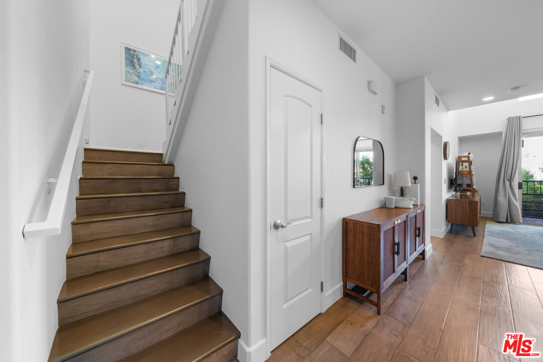 629 Traction Avenue, Unit 233 Los Angeles, CA 90013 - Photo 15 of 41 a view of entryway and hall with wooden floor