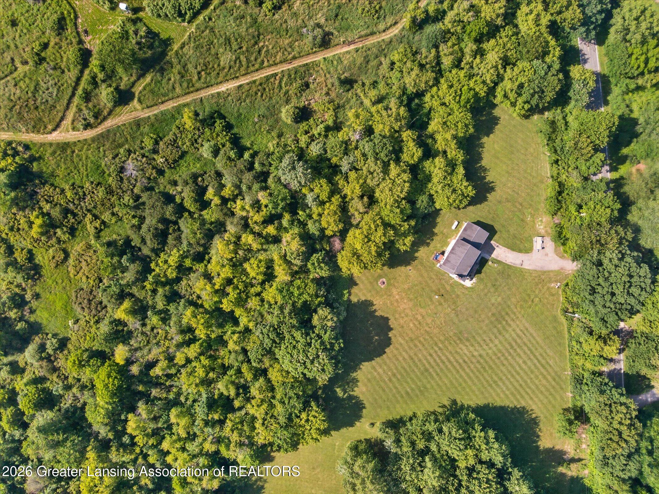 5240 Meridian Road Leslie, MI 49251 - Photo 58 of 64 58-5240-Meridian-Rd-WindowStill-Photogra