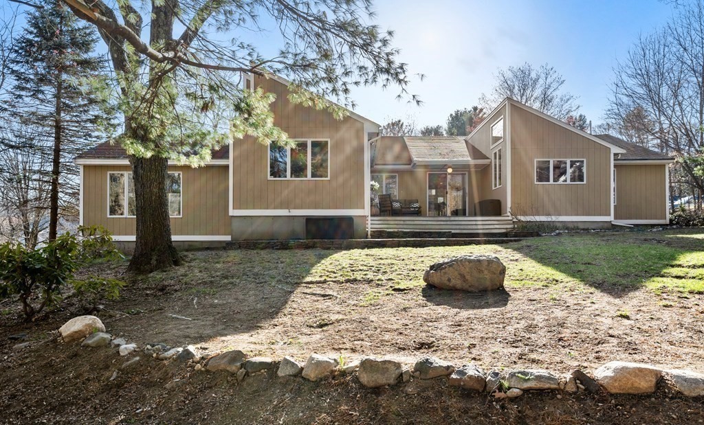 24 Flintlock Road Lexington, MA 02420 - Photo 2 of 33 a front view of a house with yard