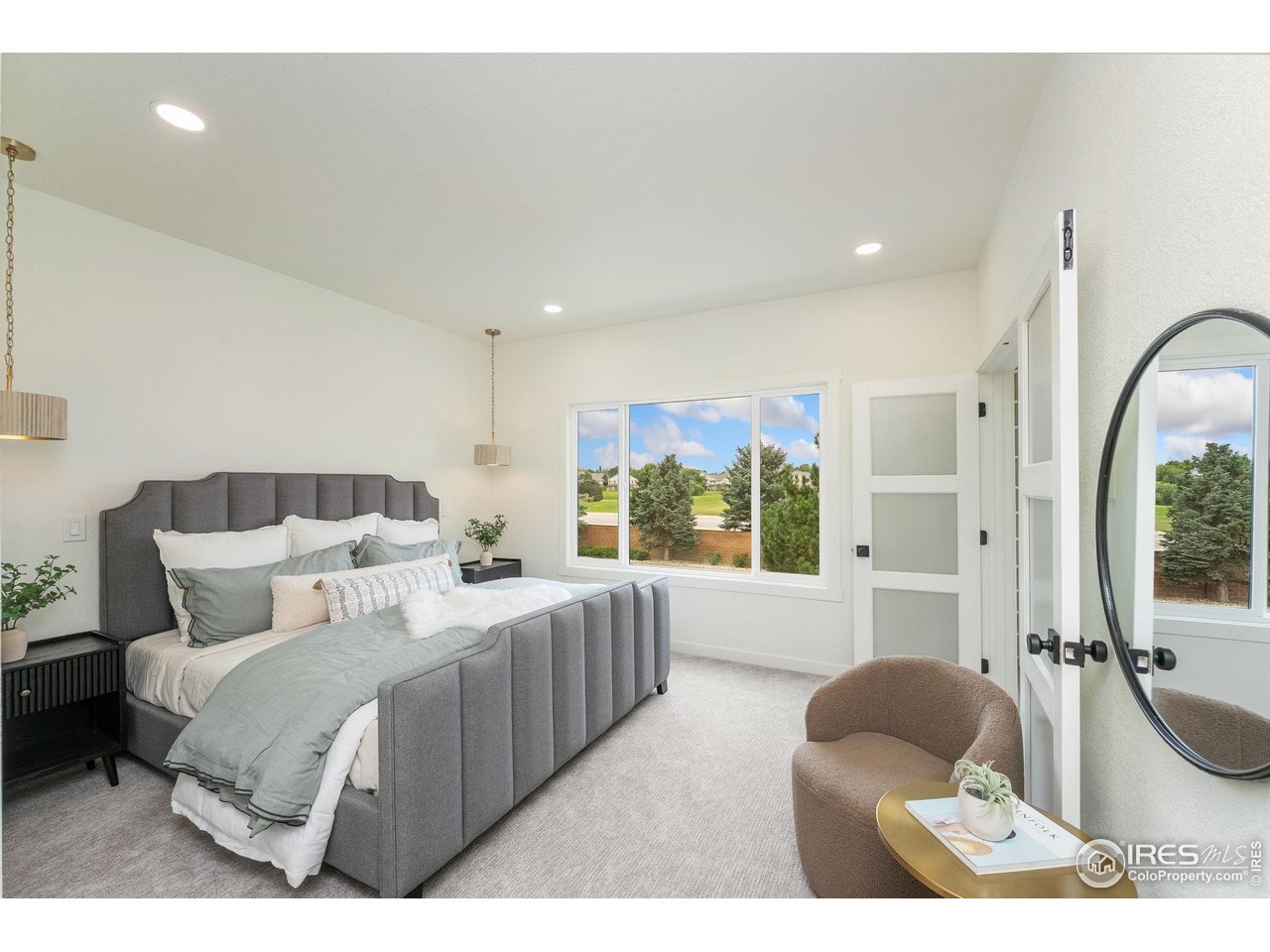 5304 Vardon Way Fort Collins, CO 80528 - Photo 20 of 47 a bedroom with furniture and a large window
