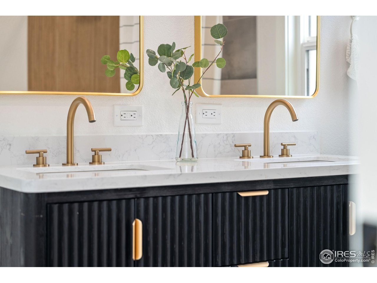 5304 Vardon Way Fort Collins, CO 80528 - Photo 32 of 47 a closeup of a sink with a potted plant on it